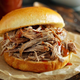 Pork sandwich on brioche bun